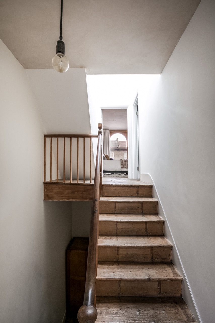 Victorian terraced house staircase with natural materials